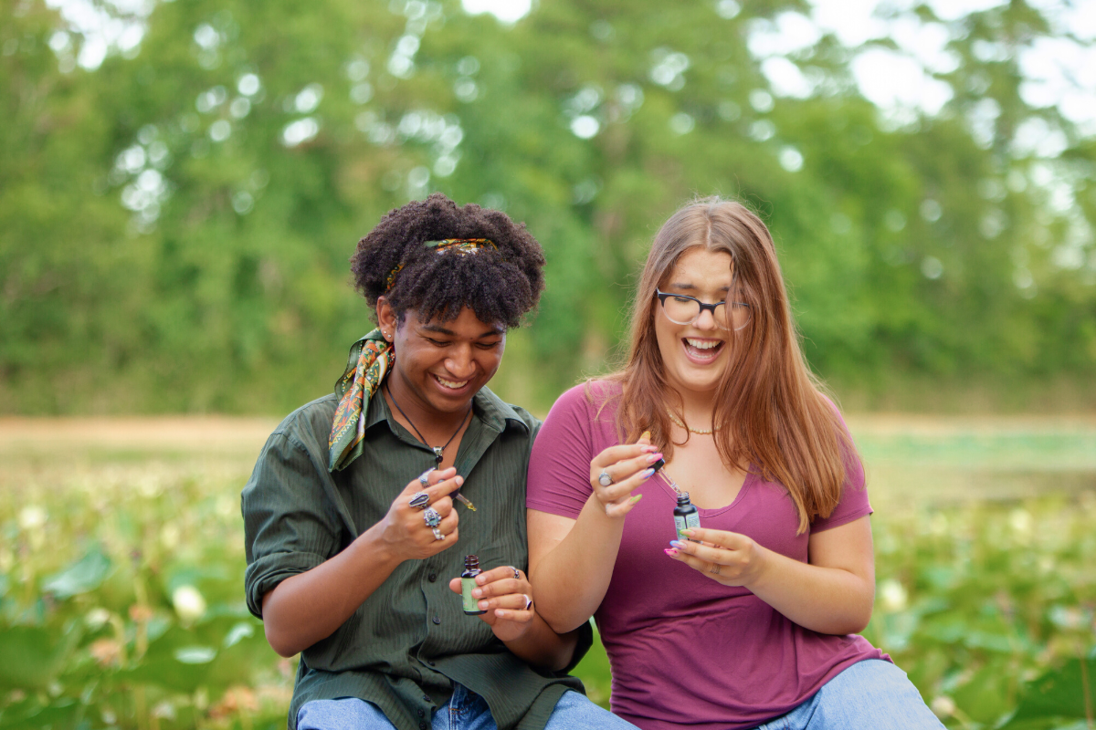 Young man and young woman taking CBD and CBG tinctures