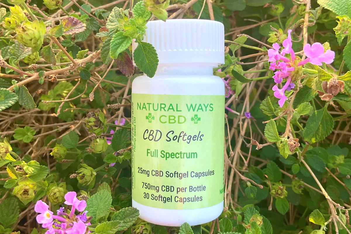 Natural Ways CBD full-spectrum CBD softgels in flowers